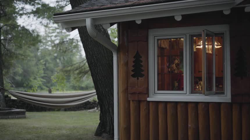 A light is illuminated from inside a cabin window