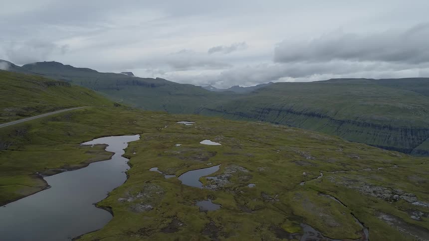 Ponds sit along a mountain