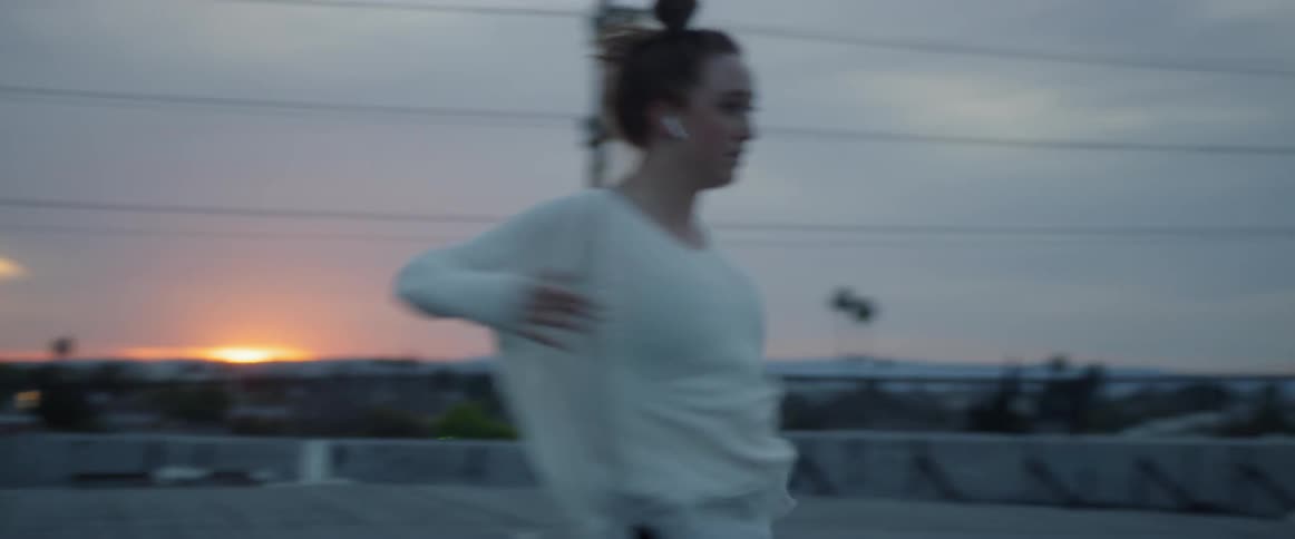 Dancers On Rooftop Overlooking City