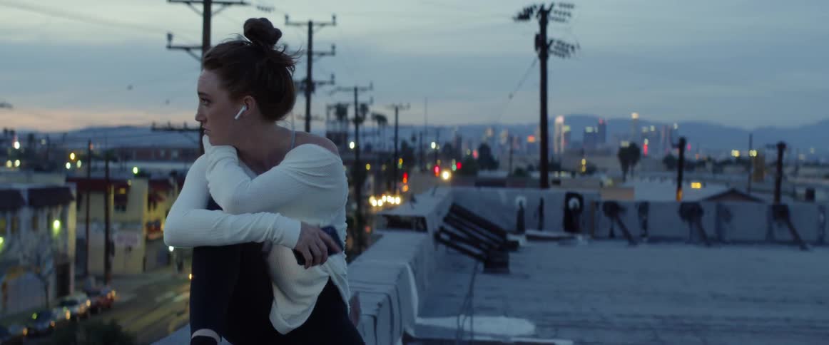 Dancers On Rooftop Overlooking City