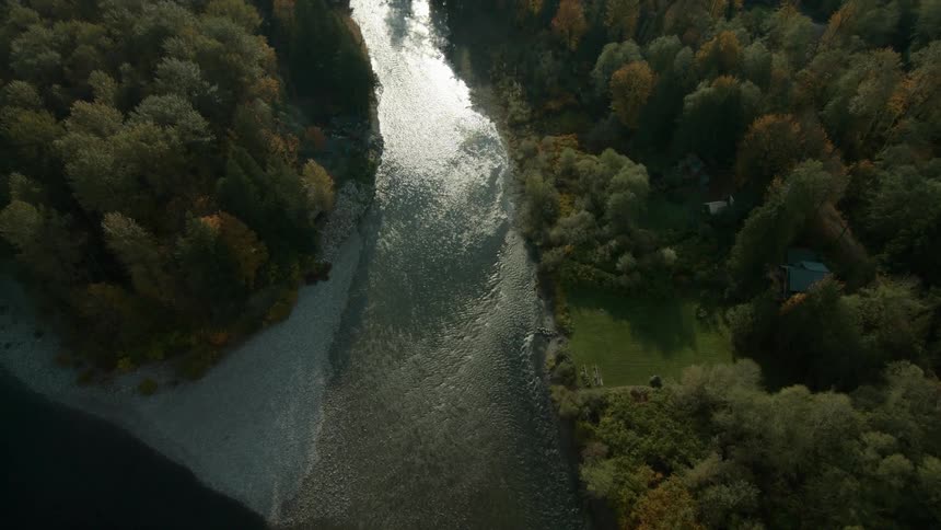A stream empties into a river