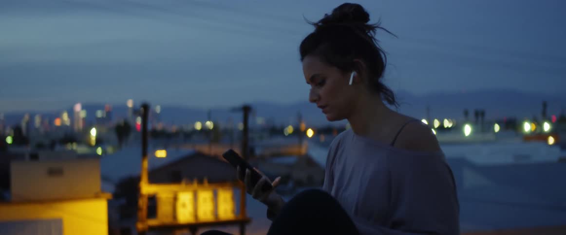 Dancers On Rooftop Overlooking City