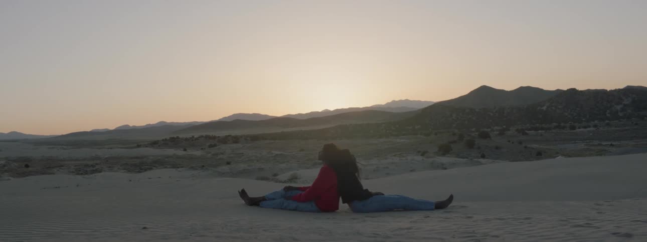 Sisters Filming Each Other With Camcorder