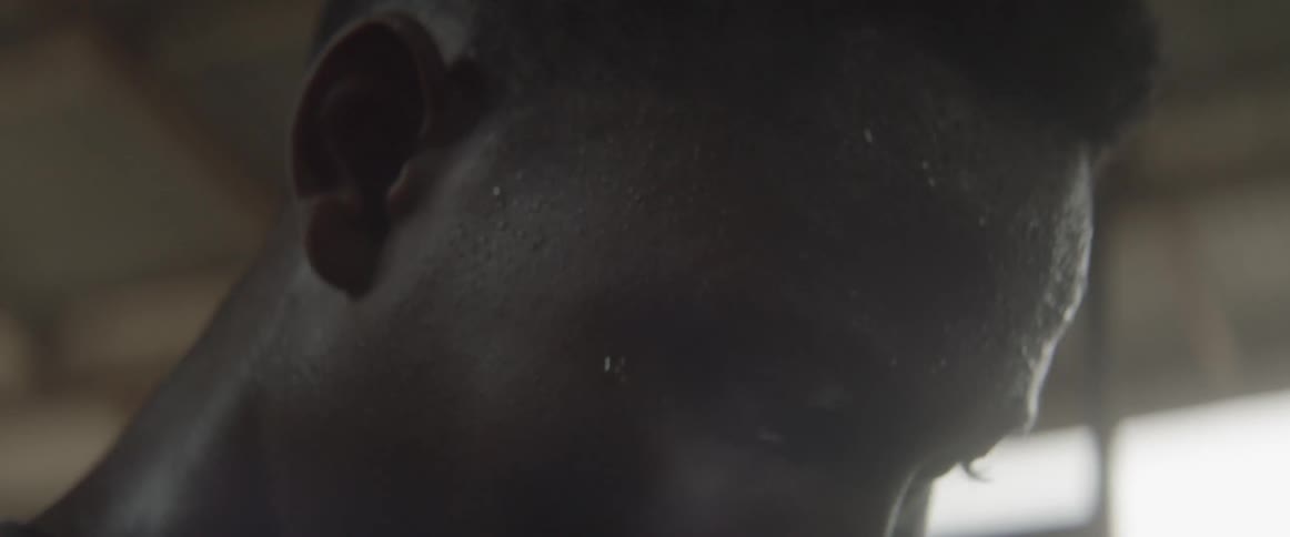 Man sweating while working out