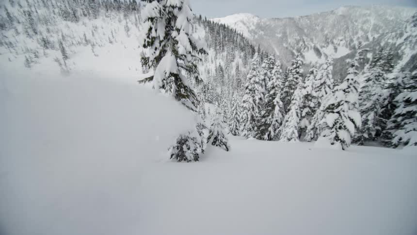 A man skiing down a slope