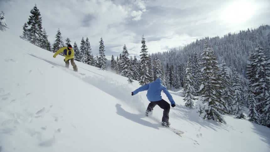 A man skiing down a slope