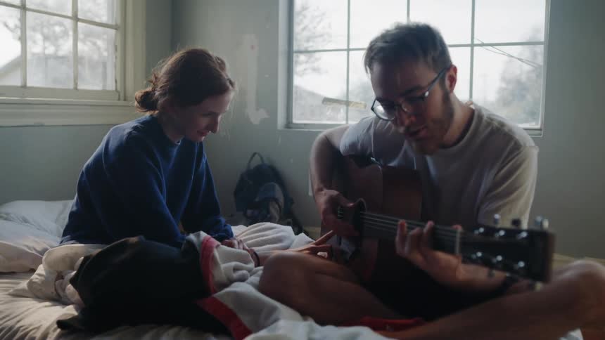 Young Couple Playing Music And Exploring