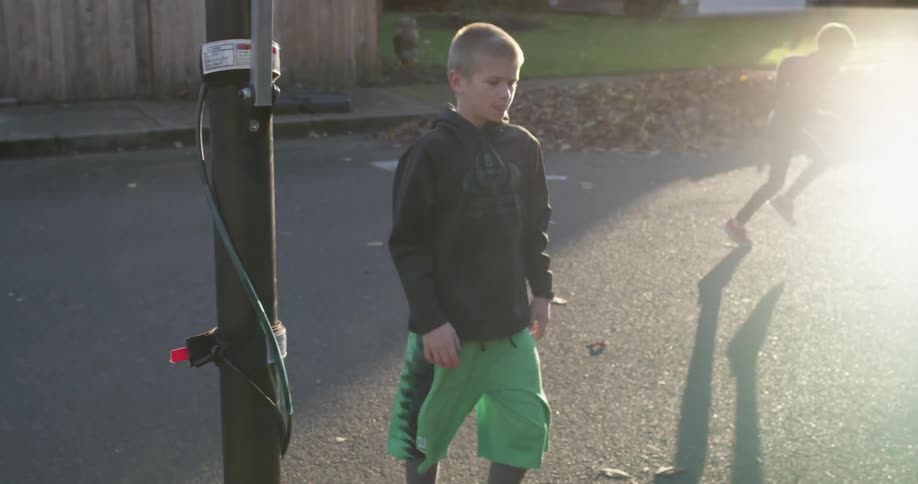 A child is playing basketball