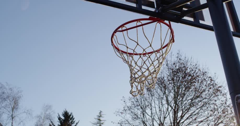 A basketball is thrown