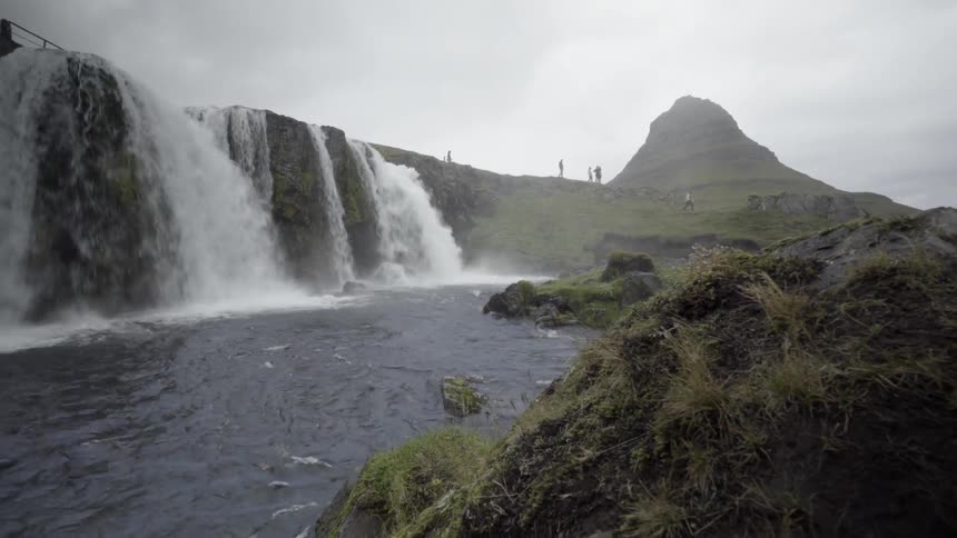 A waterfall rolling down a cliff side