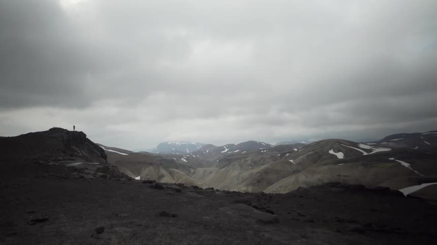 Clouds floating over a mountain range