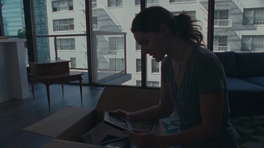 Woman is looking at a picture