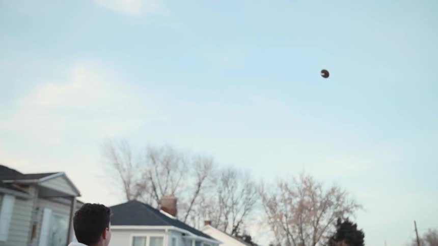 A person catching a ball