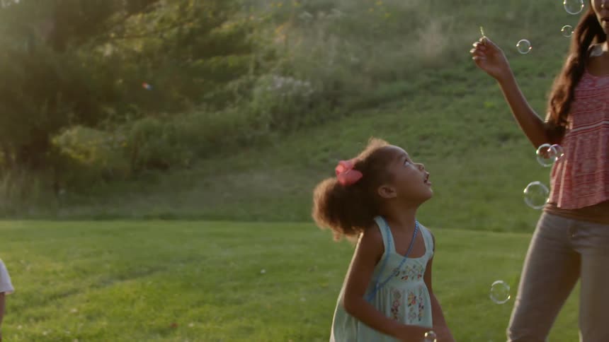 Children are playing with bubbles