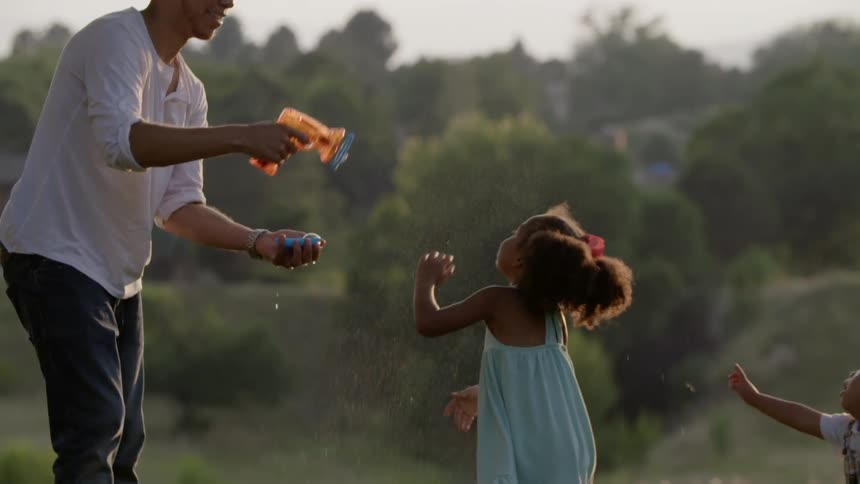 Girl playing with bubbles