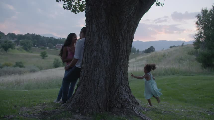 A family is under a tree