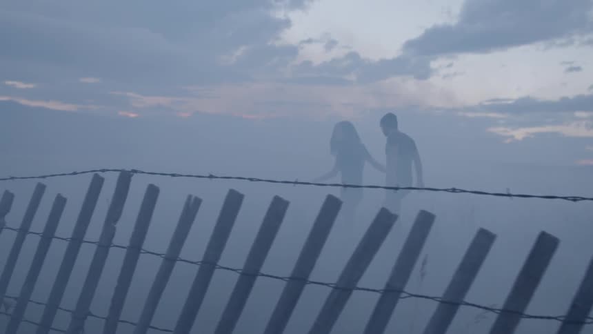 People walking in the mist
