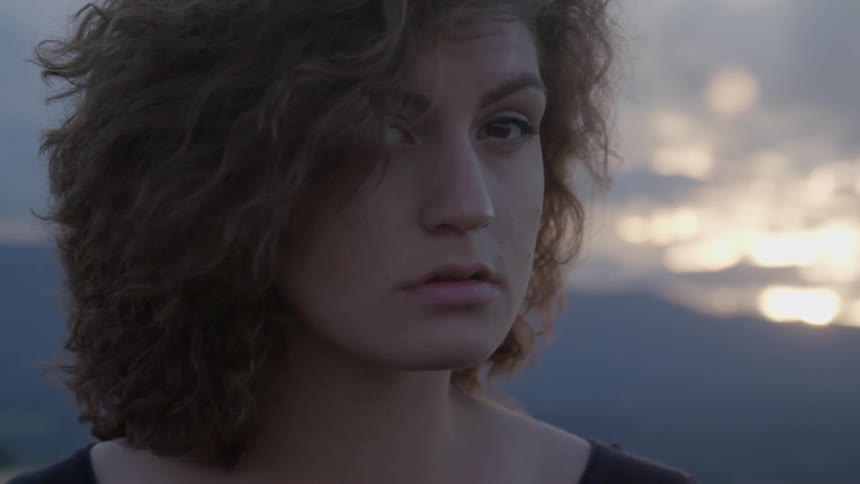 A person with curly hair