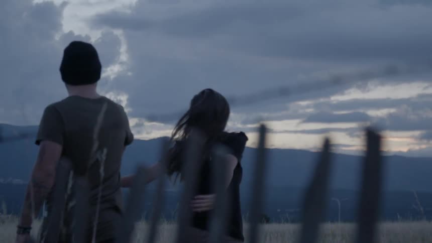 People dancing in a field