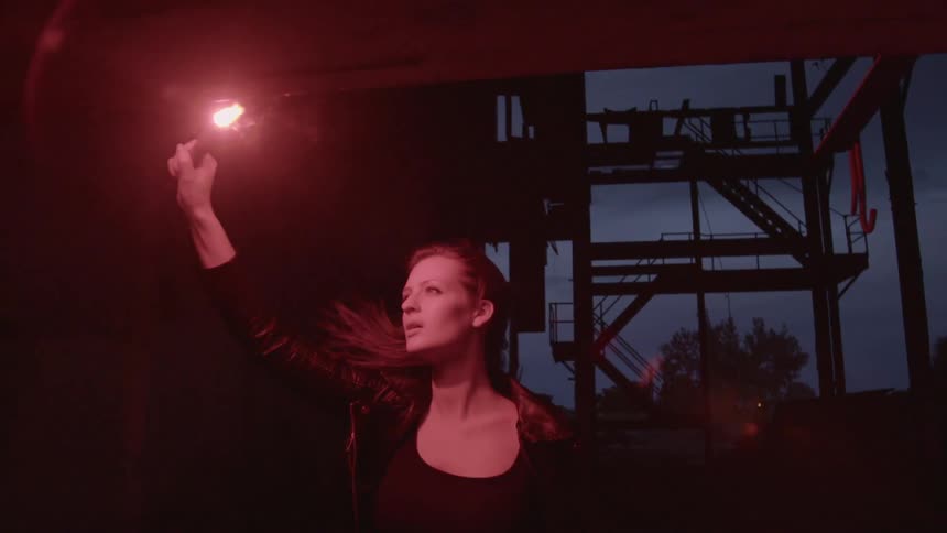 A person holding a flare