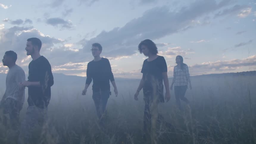 People walking in a field