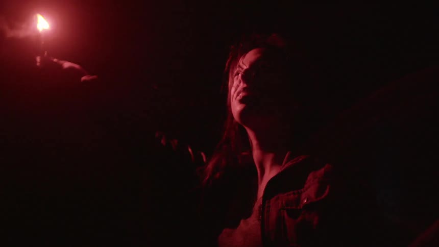 A person holding a flare