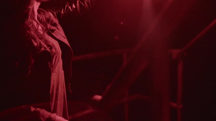 A person holding a flare