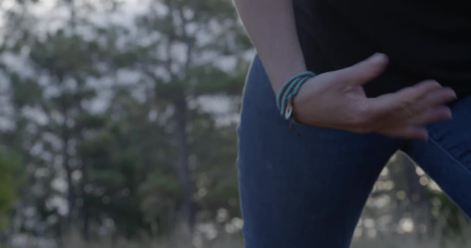A woman shaking her hand off