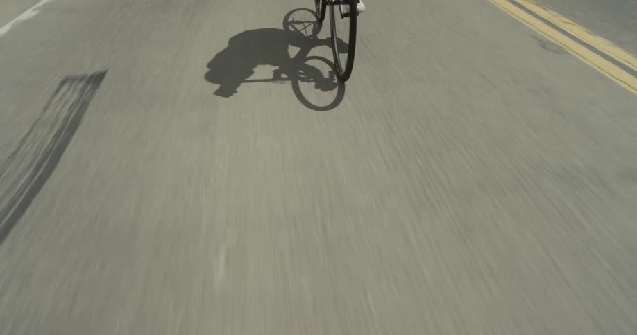 Cyclists On Hilly Roads