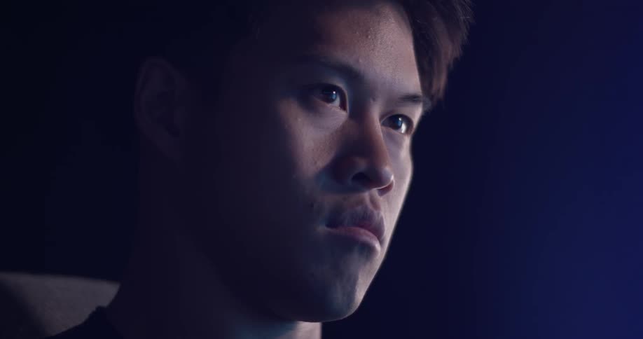 Man Coding On Computer In Dark Room
