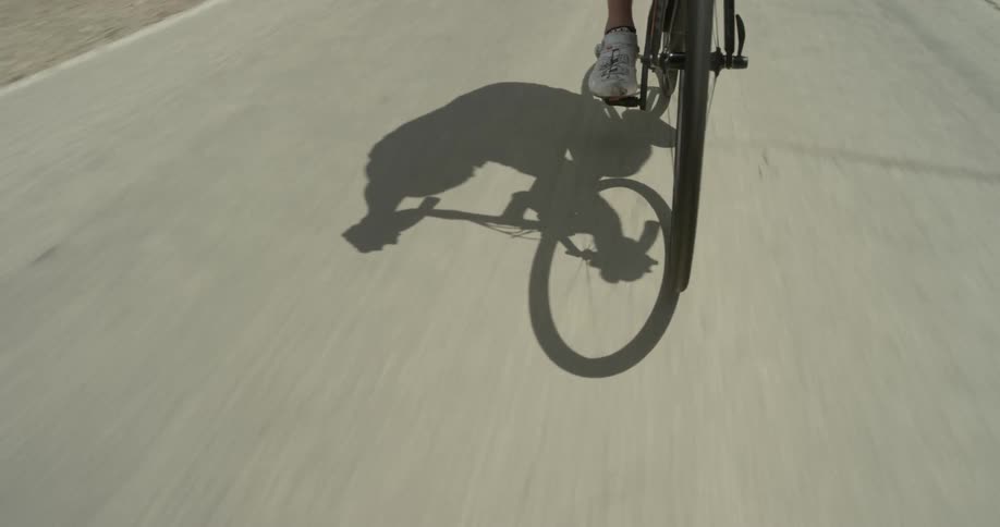 Cyclists On Hilly Roads