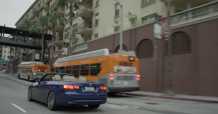 Man Driving Sports Car In City