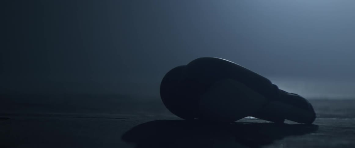 A boxing glove lands heavily on the floor