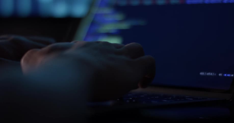 Someone is typing on a computer