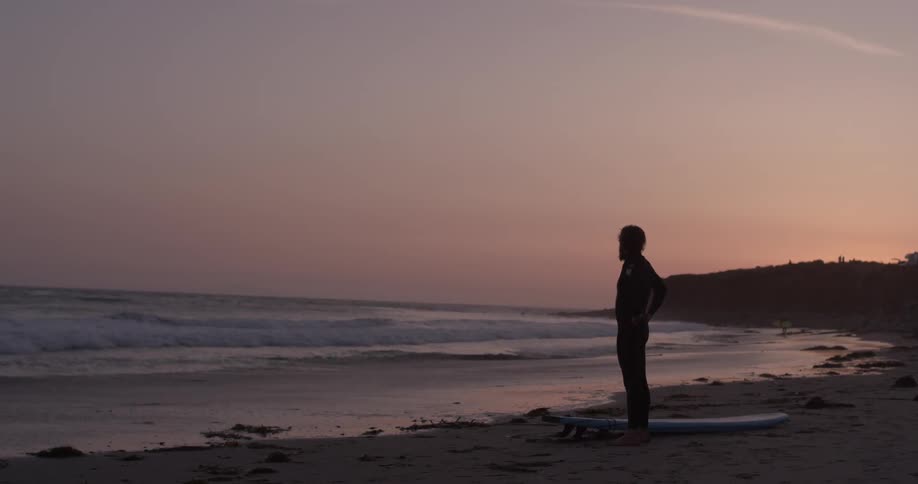 Man Driving To Beach And Surfing