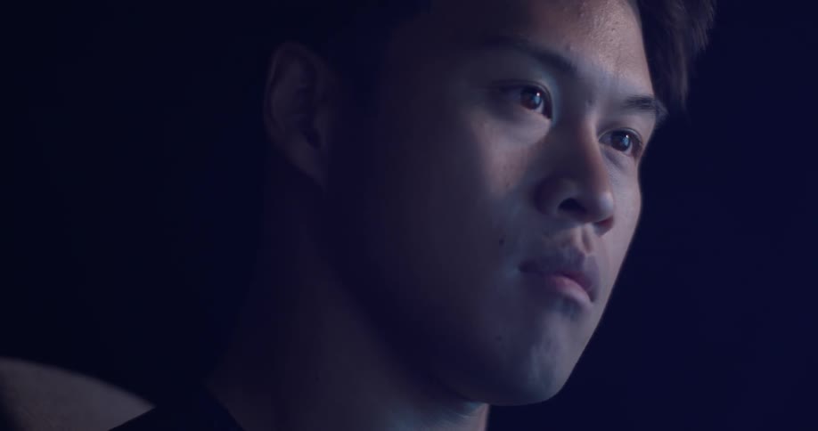 Man Coding On Computer In Dark Room