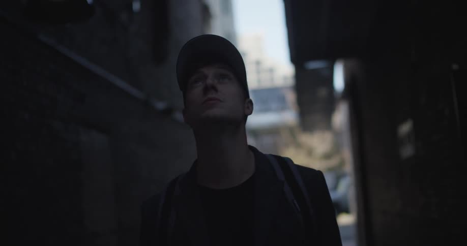 A man is walking down the street