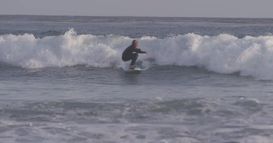 Man Driving To Beach And Surfing