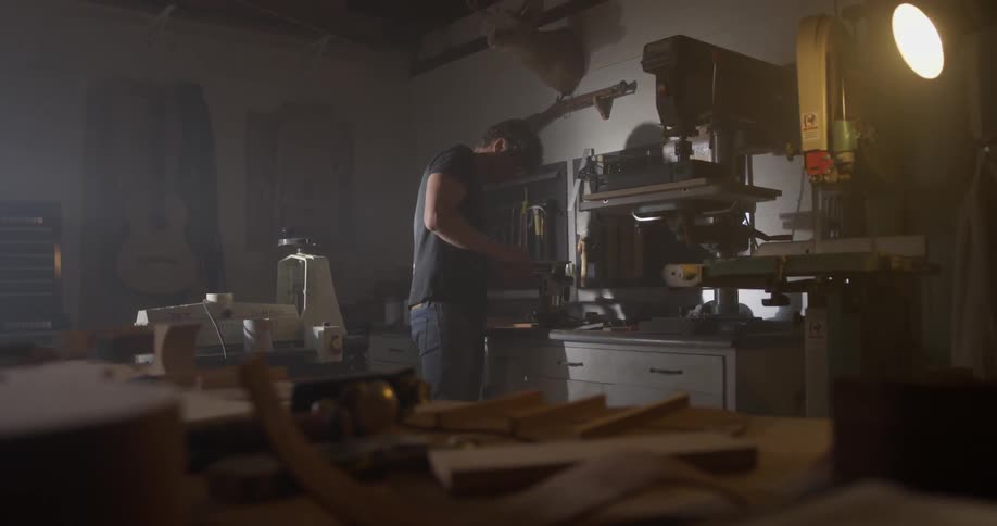 A man crafts in a workshop