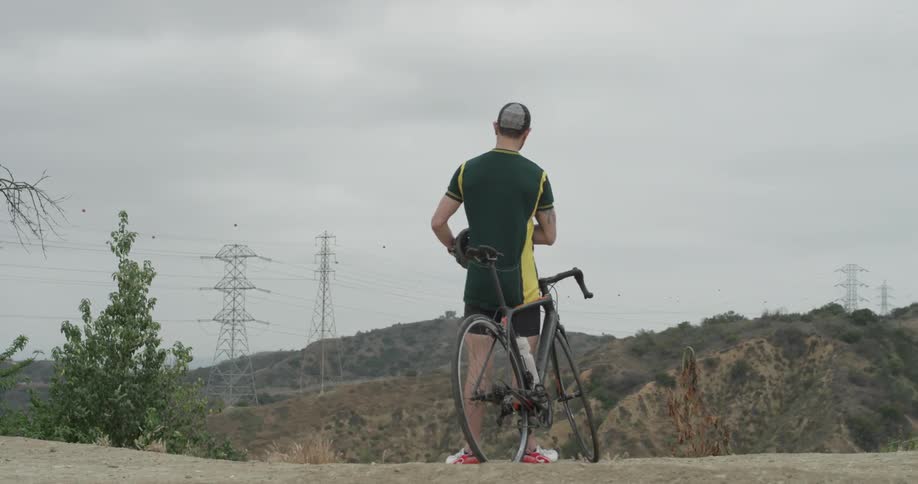 Cyclists On Hilly Roads