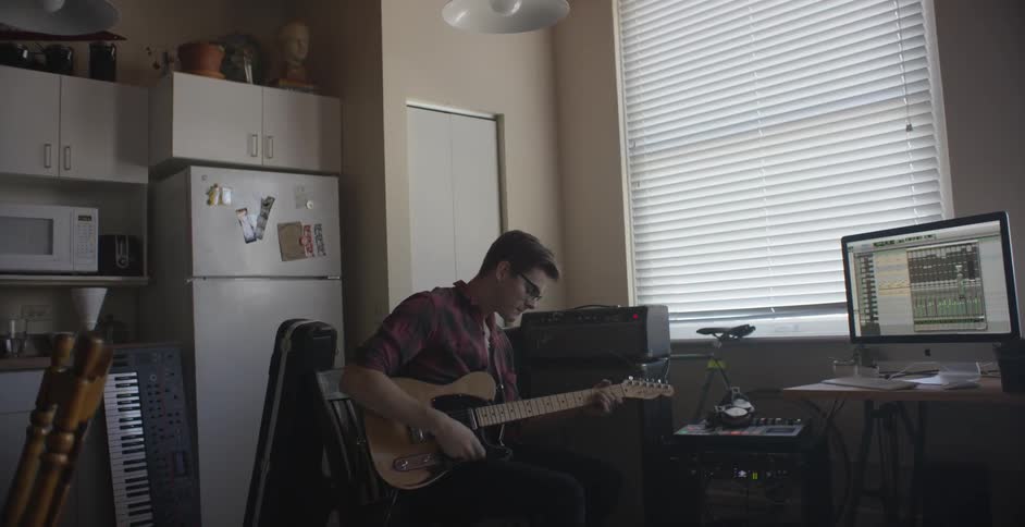 A person playing a guitar