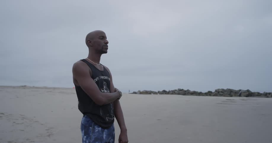 A man gazes at the ocean