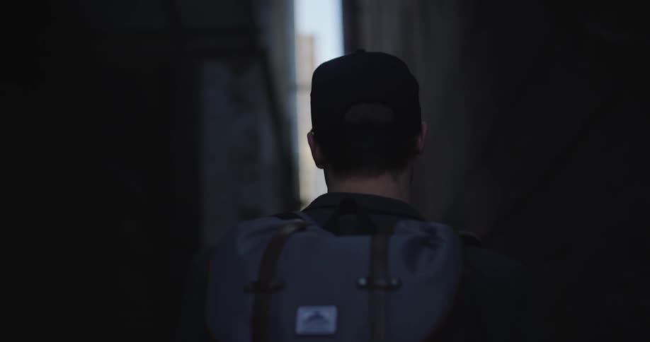A man is walking down the street