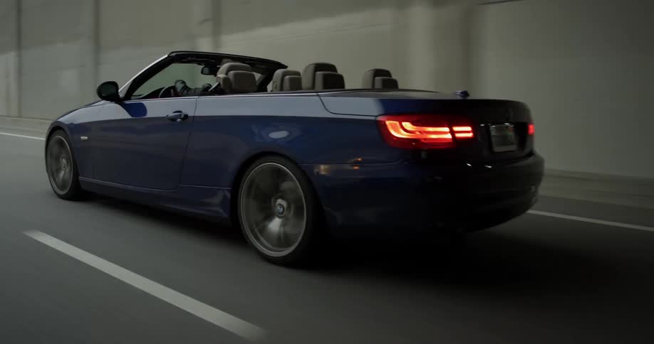 Man Driving Sports Car In City