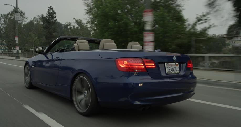 Man Driving Sports Car In City