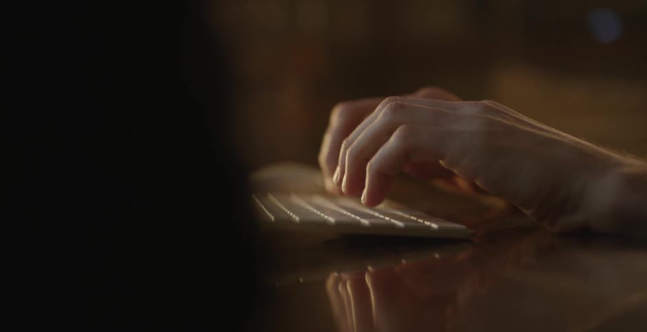 Man On Computer At Night