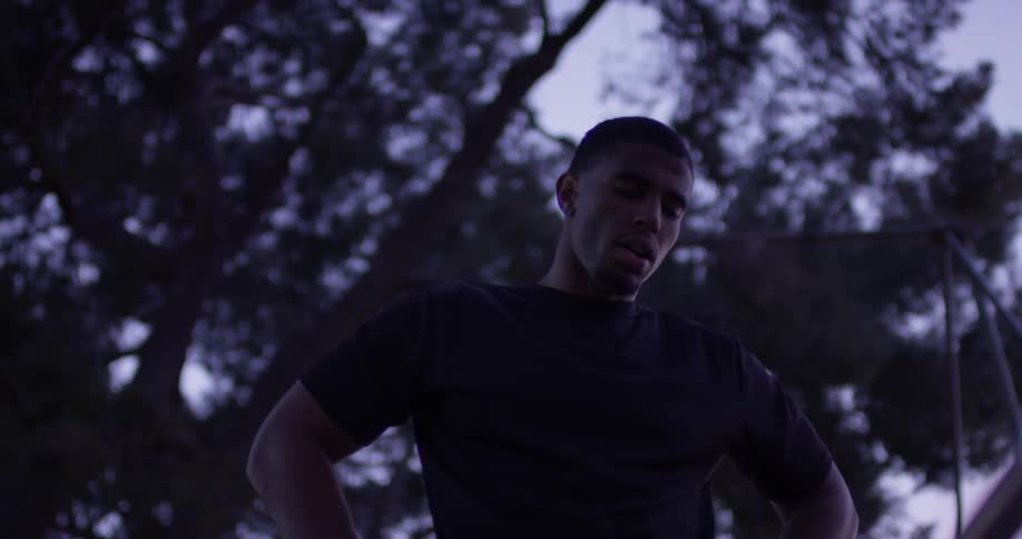 Man exercises outdoors at dawn