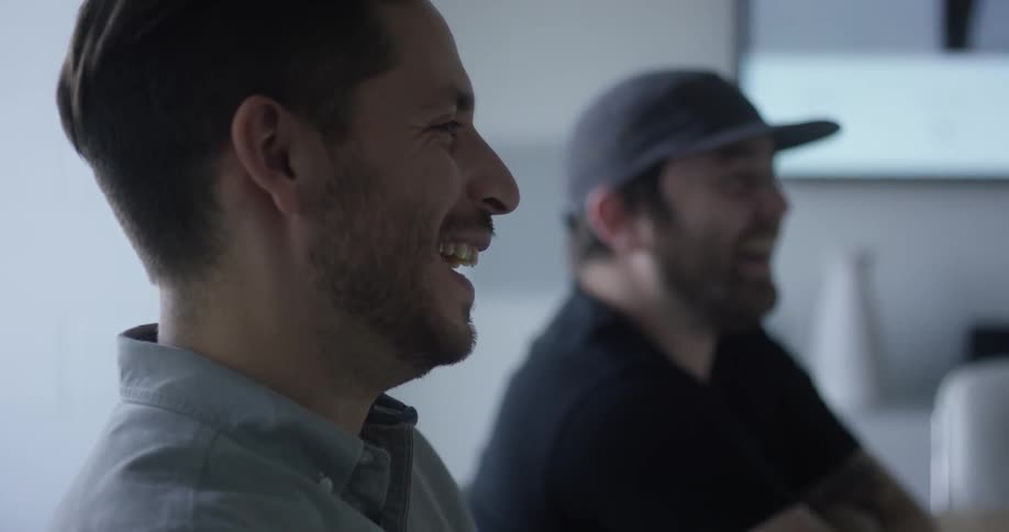 Men laughing and smiling