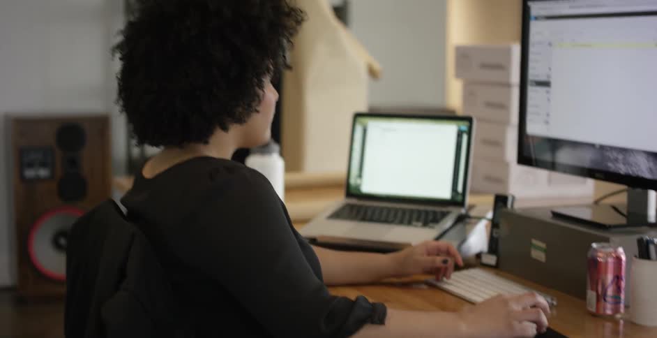A woman working at a computer