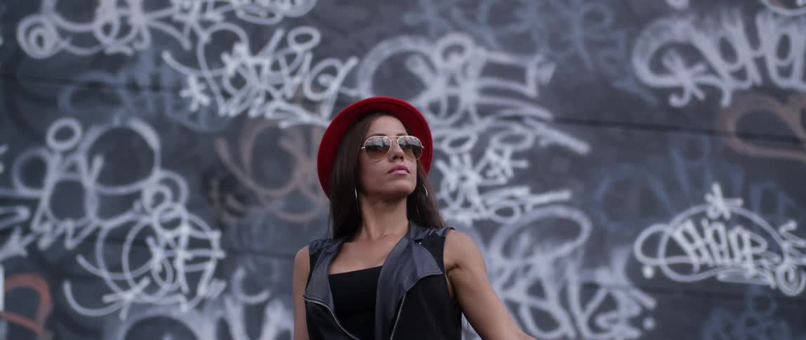 A woman is posing for a picture